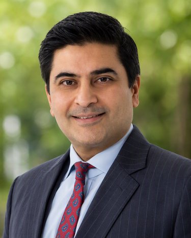 A headshot of Hammad Baig