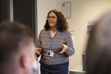 Christine runs a Citizen's Advice workshop in front of a group of people