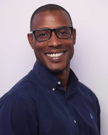 A headshot of Patrick Miller