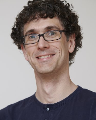 Headshot of Adam Grant