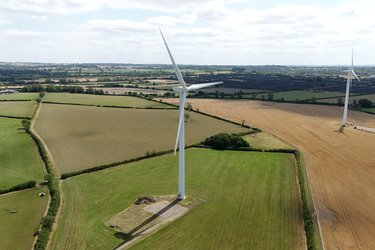 Wind turbines in a field.