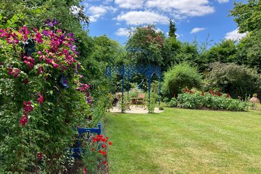 The Letchworth Open Gardens in summer, with pink, purple and red flowers in bloom.