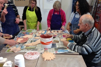 Members of Jackies Drop In, Letchworth, enjoy a clay workshop provided by Digswell Arts Trust