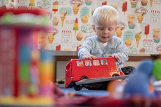 Annual Report - Boy with bus