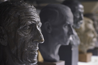 A selection of bronze and plaster busts of well known personalities from Letchworth's early years  